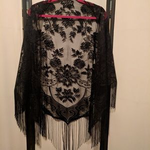 Fringed black lace shawl